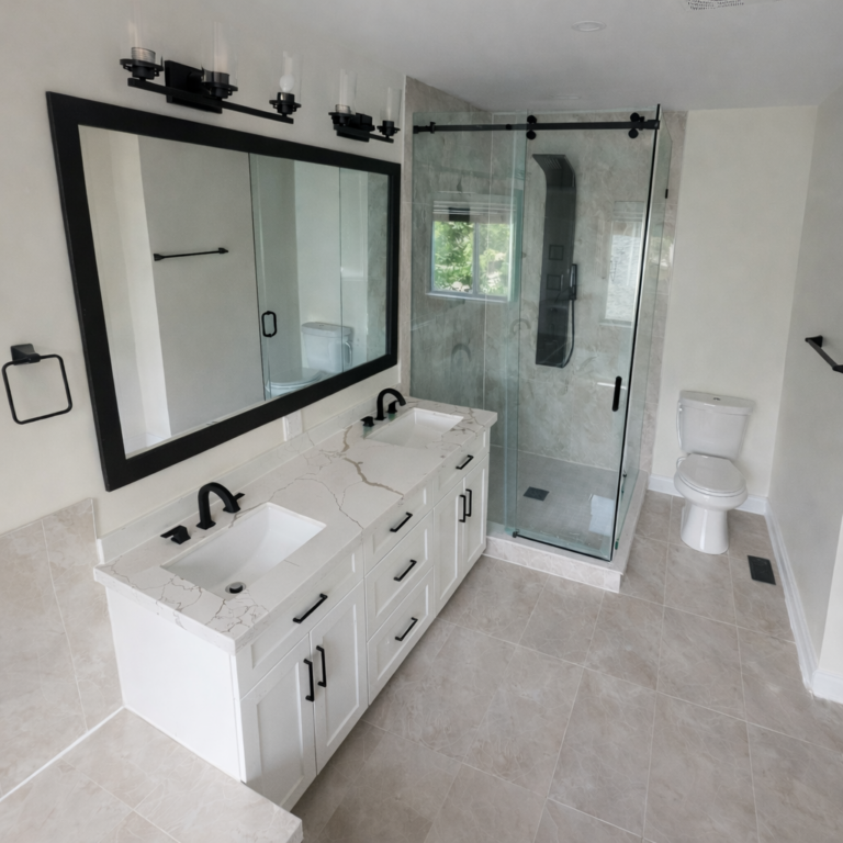 Modern bathroom with double vanity, black fixtures, quartz countertop, and glass walk-in shower.